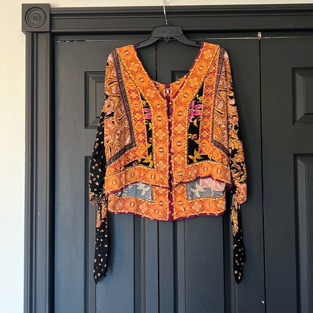 Free People top in size large